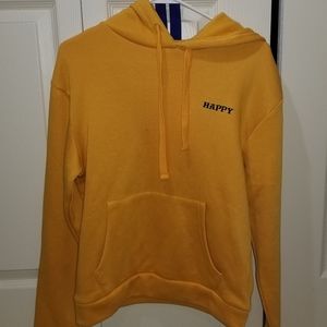 yellow pullover sweater